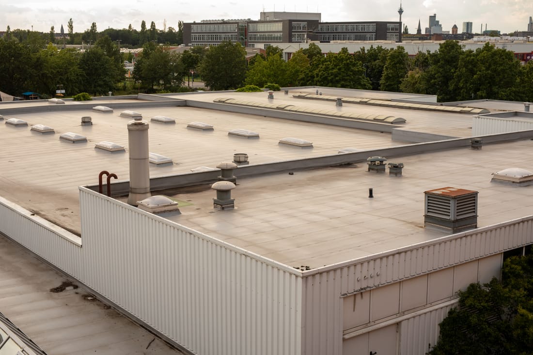 Commercial TPO membrane installation on a Triad office building in Winston-Salem