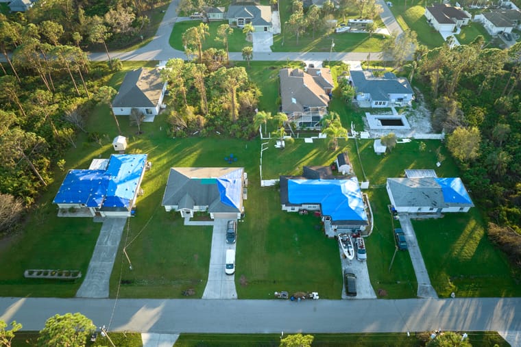 Storm-damaged roof awaiting emergency repair in the Carolinas